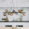 Globo Suspension Riha, longueur 86 cm, noir/gris fumé, à 9 lampes.