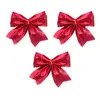Set de 3 noeuds rouges pour décoration sapin de Noël 10cm