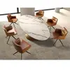Chaise pivotante en simili-cuir marron cognac