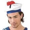 LE GEANT DE LA FETE Le béret marin en tissu est blanc, bleu et noir avec un pompon rouge. Il completera parfaitement votre déguisement de marin à