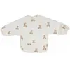 Jollein 029-869-66095 Bavoir imperméable avec manches Motif ours en peluche Blanc
