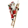 Décoration de Noël Père Noël sur une échelle avec un cadeau, 65 cm