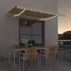vidaXL Auvent manuel rétractable avec LED 450x300 cm Jaune et blanc