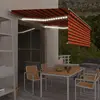 vidaXL Auvent Manuel LED 4,5x3 m Orange/Marron