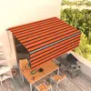 vidaXL Auvent manuel rétractable avec store 4,5x3 m Orange et marron