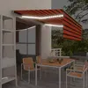 vidaXL Auvent manuel avec store LED - Orange et marron
