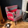 Now's Home Fauteuil en kilim brodé main et pieds en bois noir