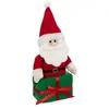 ATMOSPHERA Père Noël traditionnel Rouge et Blanc avec paquet cadeau H 35 cm