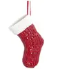Sia Deco Suspension décorative chaussette de noël en grès blanc et rouge H12