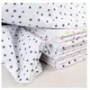 GENERIQUE Tissu coton étoilé sur fond blanc vendu au mètre(...) - étoilegalet