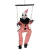 Clown sur balançoire à suspendre - animé, sonore, lumineux - 70cm 24619PC