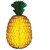 Grand Ananas en papier de soie alvéolé jaune 36cm