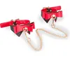 LOVE AND VIBES Menottes chevilles à noeuds papillons Be Mine