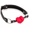 LOVE AND VIBES Gag-ball en similicuir avec coeur en silicone