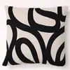 Becquet Coussin noir en coton SPIRO