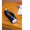Trousse ronde Mia Carreaux
