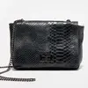 1987 by Abaco - Sac bandoulière en Cuir Tatou noir - 21x15x6 cm OS