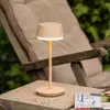 Konstsmide Lampe à poser LED rechargeable Lyon, sable, IP54, variateur...