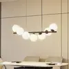Lucande Suspension Isandro, noir / opale, à 7 lampes