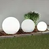 LAMPENWELT Lindby Lampes solaires LED Lago, set de 3 boules, piquet de terre, blanc