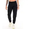 Asics Pantalon Core Woven