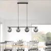 JUST LIGHT. Suspension Big Widow, boules de verre, à 4 lampes