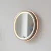 Paul Neuhaus Miroir mural LED VIDRO, bronze, Ø 26 cm, métal/verre inte...