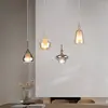 Trio Lighting Suspension Aldea, longueur 65 cm, verre blanc/ambre/chro...
