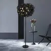 Reality Leuchten Lampadaire Leavy, noir/or, hauteur 180 cm, plastique