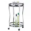 Idimex Chariot de service VEGA table d'appoint ronde sur roulettes chariot à thé et boisson en métal chromé 2 étagères en verre trempé