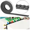 Infactory : Bande adhésive 1 m pour briques de construction - Noir