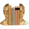 Serre-livres visage doré set de 2 Kare Design