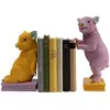 Serre-livres cochons jaunes et violets set de 2 Kare Design TU
