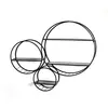 3S. x Home étagère murale design noir en tube d'acier laqué