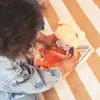 Poupée Mela et son couffin (21 cm)