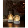 Sirius Boule à neige LED Santa avec effet chute de neige