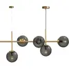 Dyberg Larsen Como suspension, à 5 lampes, laiton