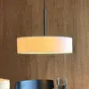 Suspension Calix de Dyberg Larsen, hauteur 12 cm, blanc naturel