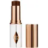 Charlotte Tilbury Unreal Skin Sheer Glow Tint - Stick Fond de teint Hy...