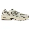 Chaussures New Balance 530 beige clair marron foncé - 43