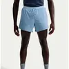 Short de running avec sous-short intégré Dri-FIT Nike Stride 13 cm pou...