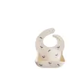 Mushie Bavoir à poche en silicone Baleine