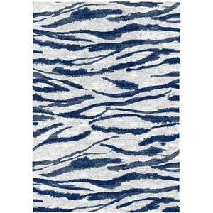 Naf Naf - Tapis bleu peinture abstrait design plat Jibra Bleu 120x170 pas cher