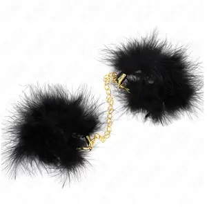 Comparateur de prix : Manchettes en plume avec chaîne or modèle 2   Élégance et Contrôle