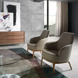 Angel Cerda Fauteuil simili cuir et pieds en bois pas cher