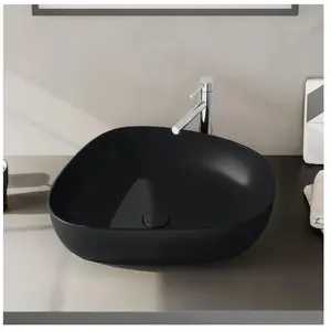 Comparateur de prix : Vitra - Vasque à poser couleur Outline, 56 x 44, asymetrique, Noir mat