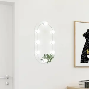 Comparateur de prix : vidaXL Miroir avec éclairage LED 60x30 cm Verre Ovale