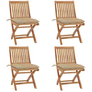 vidaXL Chaises pliables de jardin avec coussins 4 pcs Teck solide pas cher