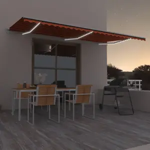 Comparateur de prix : vidaXL Auvent automatique capteur de vent LED 600x300 cm Orange marron