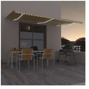 vidaXL Auvent manuel rétractable avec LED 600x300 cm Jaune et blanc pas cher